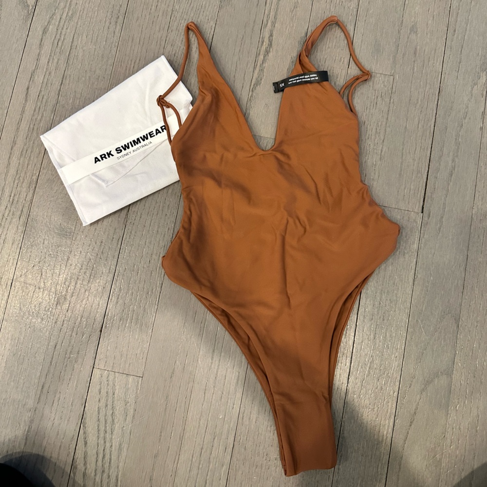 Deep V one piece bathing suit. XS. Brown. BRAND NEW NEVER BEEN WORN.